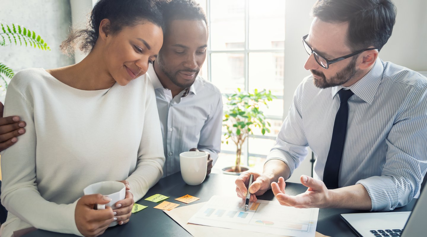 Family couple consultations with a lawyer or insurance agent. Law and insurance.