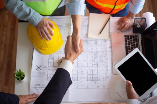Hand in hand between project contractors and customers due to negotiation of expenses and investments, construction and repair of residential buildings.