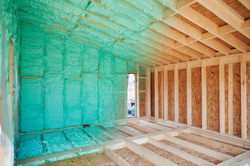 Photo collage before and after thermal insulation room in wooden frame house in Scandinavian style barnhouse. Comparison of walls sprayed by polyurethane foam. Construction and insulation concept.