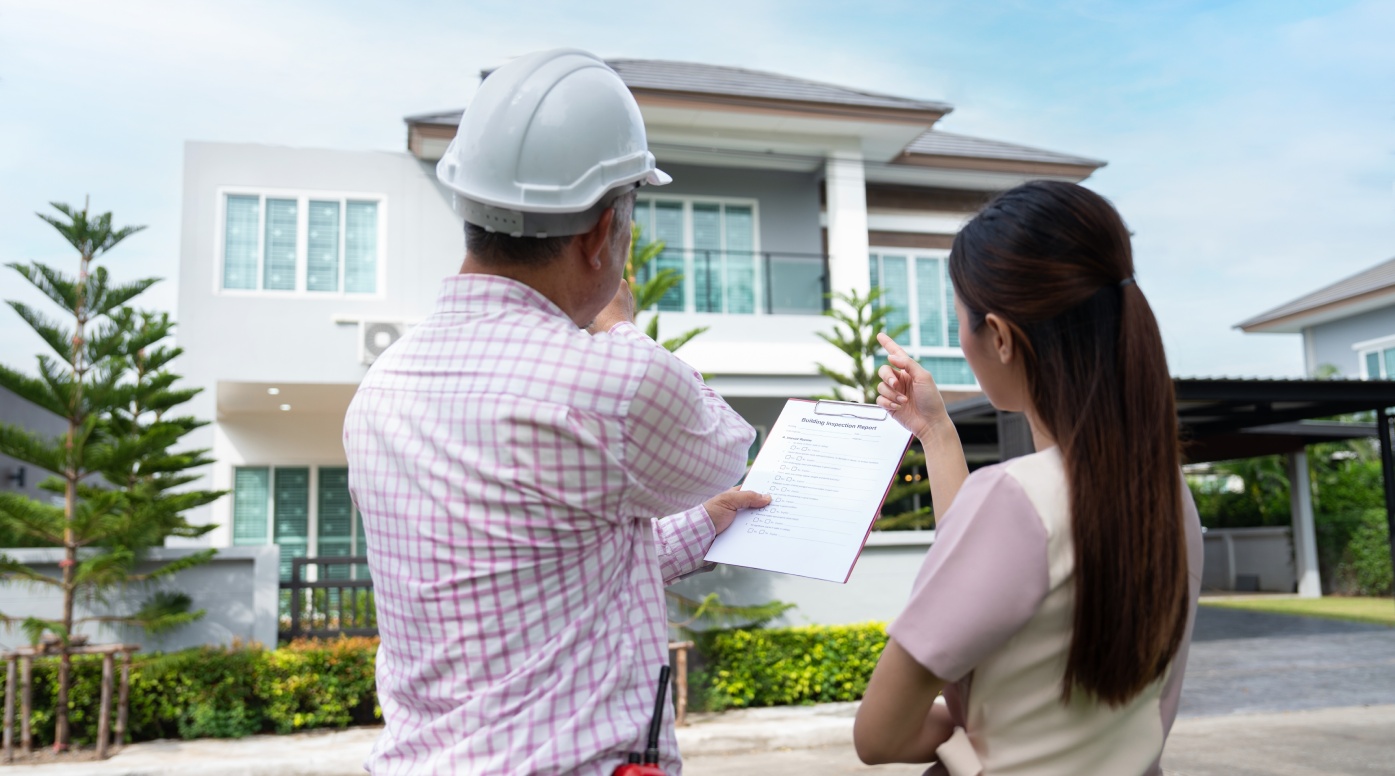 Senior home inspector explains Inspection results with homeowner, handyman holding clipboard and after checking details before renovations home, house improvement interior, Interior design Real estate